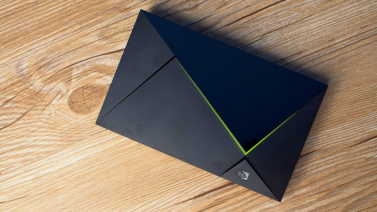 Nvidia Shield TV on wooden surface.