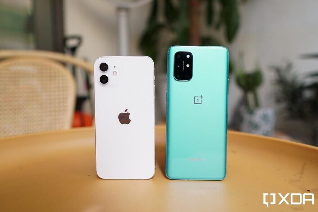 iPhone 12 and OnePlus 8T standing on a table