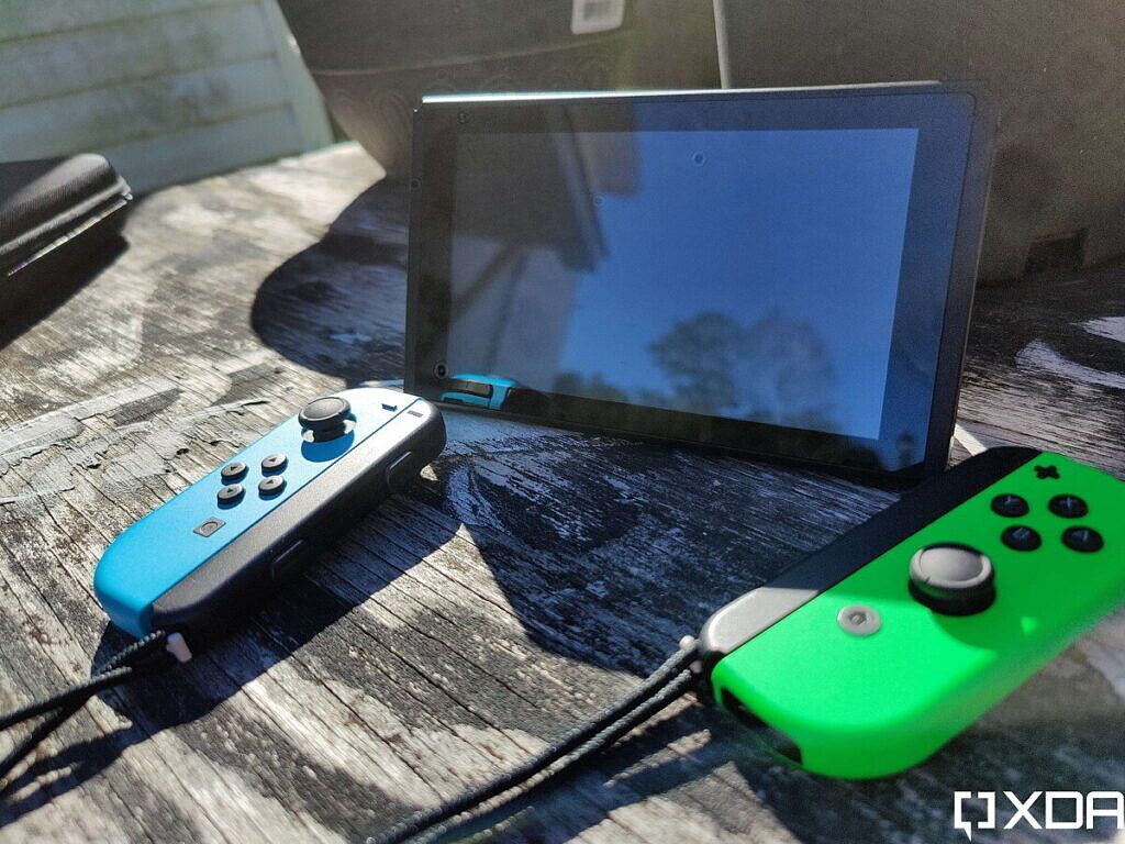nintendo switcvh with joy-cons detached, outside