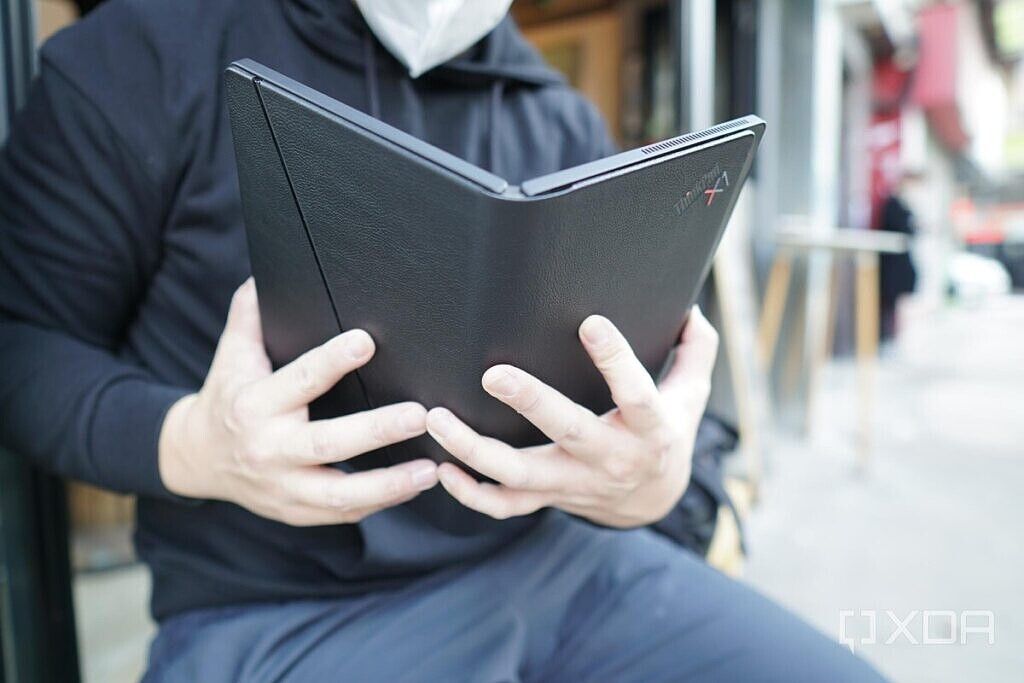 Using the Lenovo ThinkPad X1 Fold in book form.