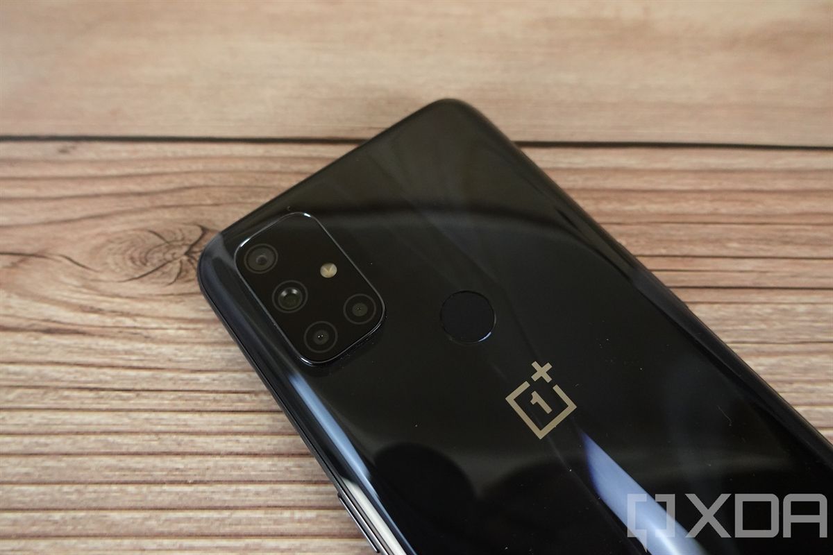 Black OnePlus Nord N10 5G on wooden background