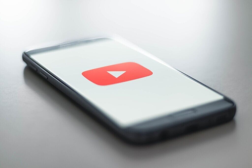 YouTube logo on phone