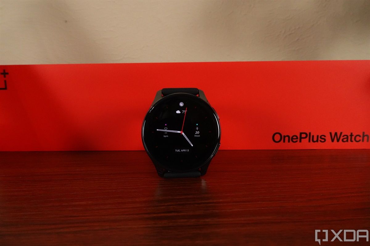 OnePlus Watch in front of box