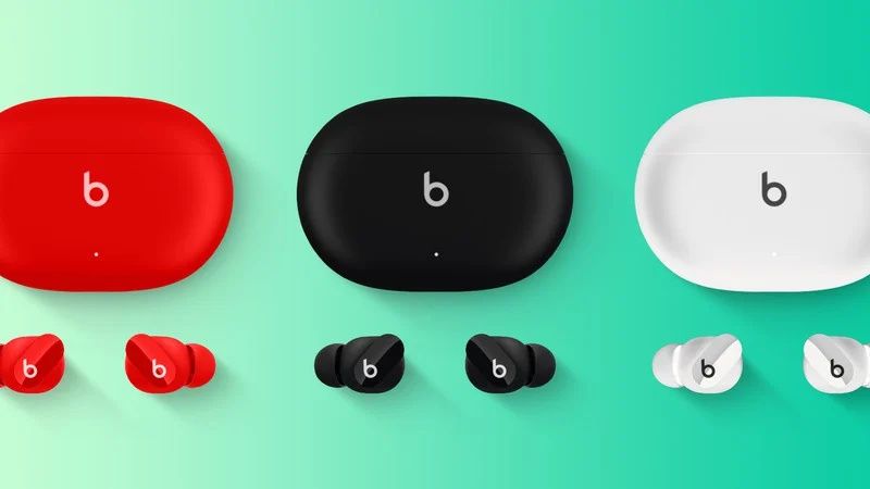 Three Beats Studio Buds in red, black, and white