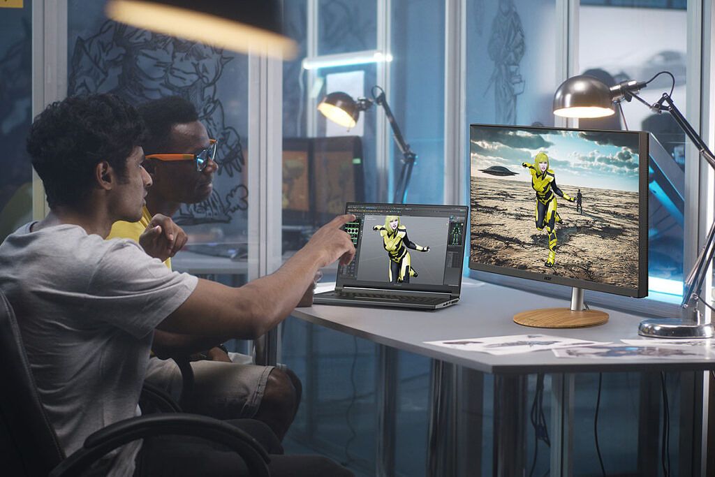 Man using Acer ConceptD 5 Pro with external monitors