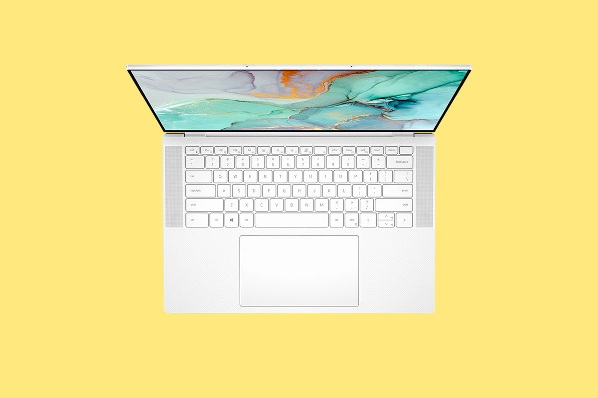 Dell XPS 15 9510 frost white on yellow background