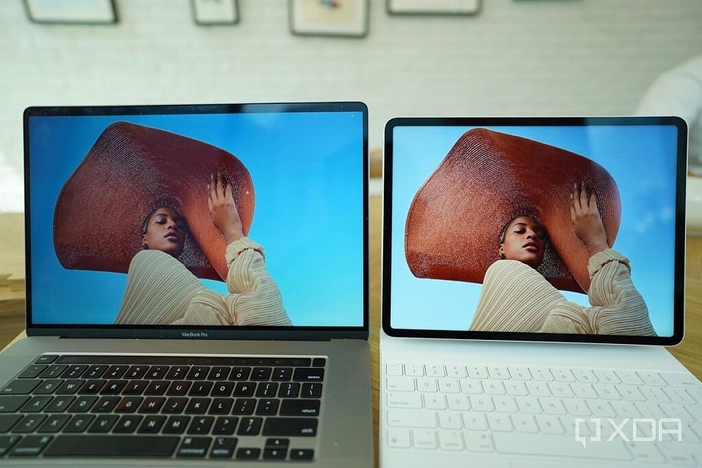 A 2019 MacBook Pro's screen next to the 2021 iPad Pro's screen.