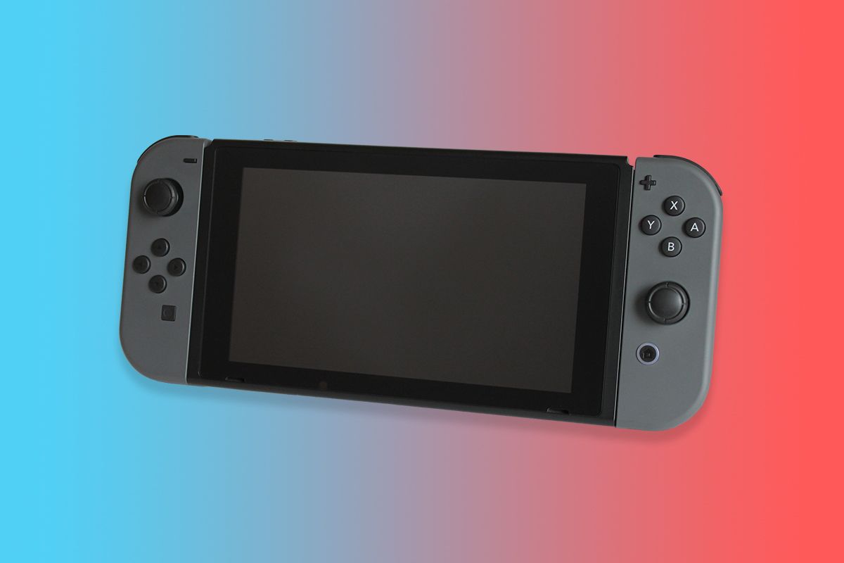 Gray Nintendo Switch on red and blue gradient background