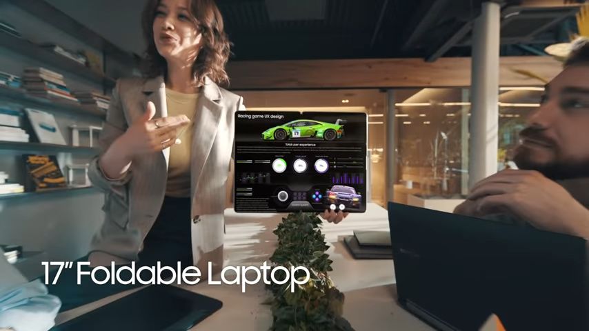 Samsung Display 17-inch foldable laptop held out in hand