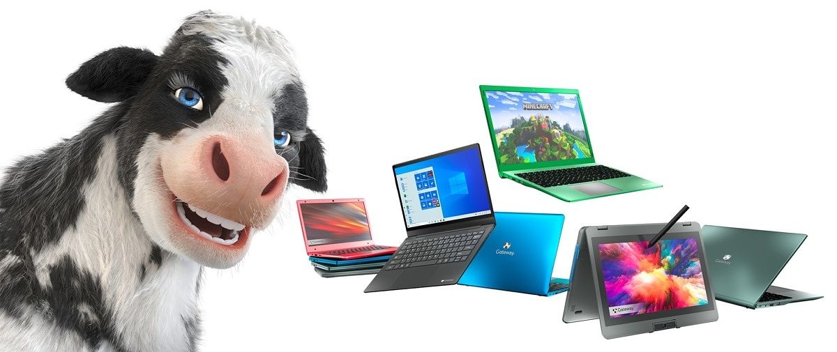 A press image of several Gateway laptops next to the face of a CGI cow, which stares into your soul. Do not approach the cow.