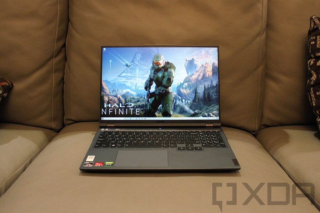 Front view of Lenovo Legion 5 Pro on gray couch