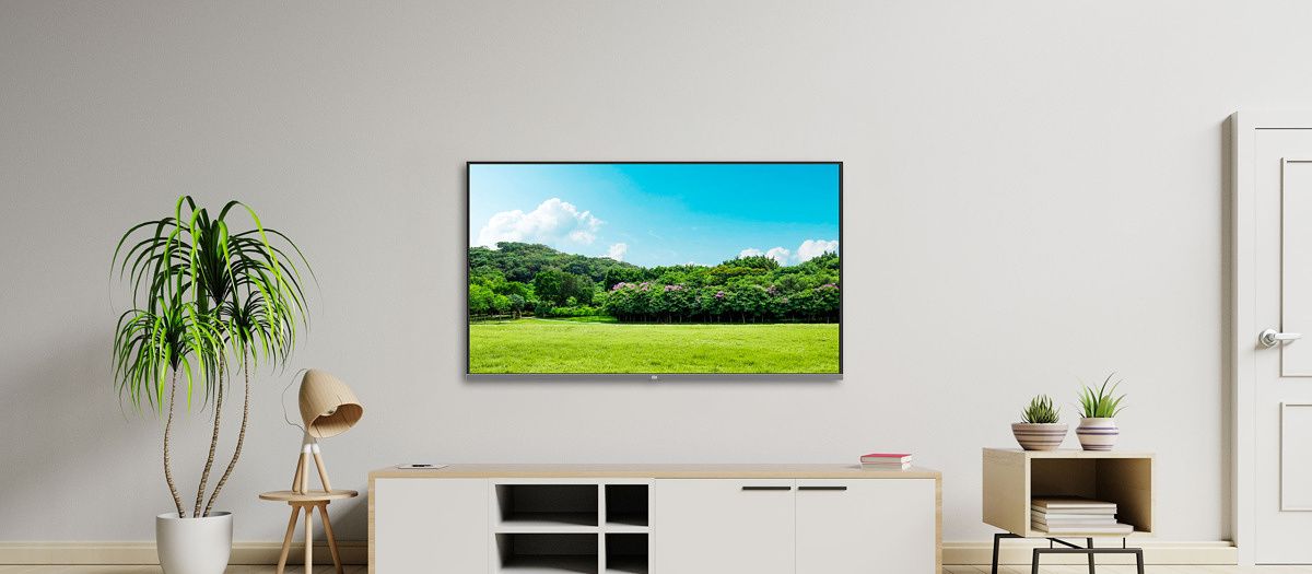 Mi TV 4A 40 Horizon Edition mounted on a wall.