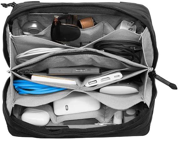 Keep all your cables, hard drives, USB drives, chargers, cables and other small accessories organized with the Peak Designs Tech Pouch that offers a number of storage pockets with its origami-style internal layouts.