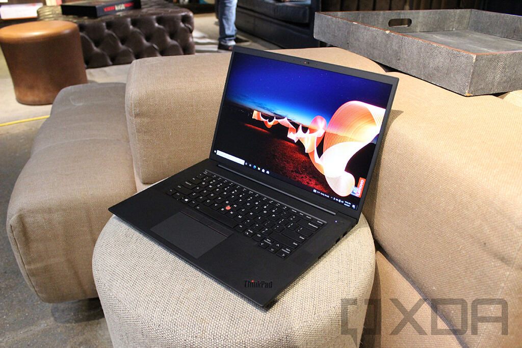 Lenovo ThinkPad X1 Extreme angled view on beige couch