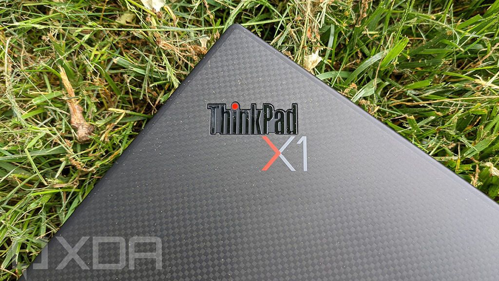 Close up of ThinkPad X1 logo with carbon fiber weave