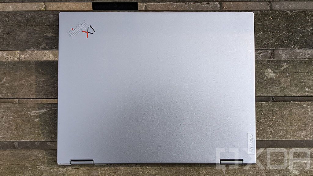 Top down view of ThinkPad X1 Titanium Yoga on wooden bench