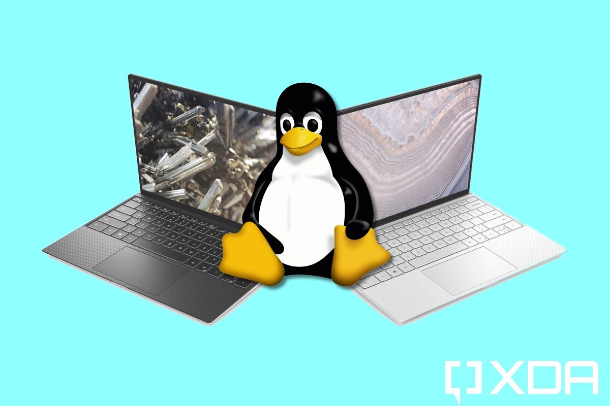 Two Dell XPS 13 laptops with the Linux logo on top
