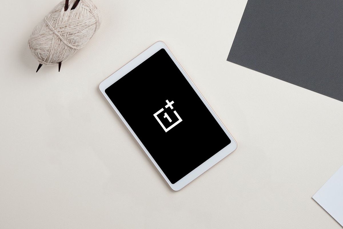 Tablet mockup with OnePlus logo on black background