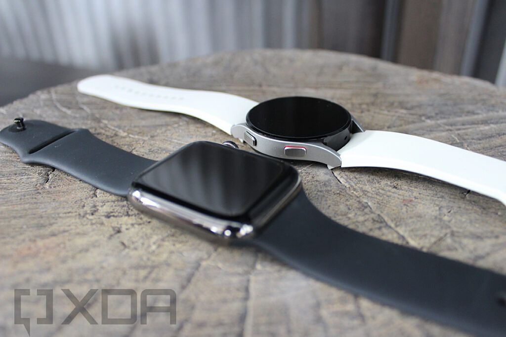 Angled view of Apple Watch and Samsung Galaxy Watch 4