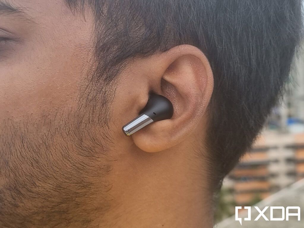 OnePlus Buds Pro sitting inside the ear canal of wearer