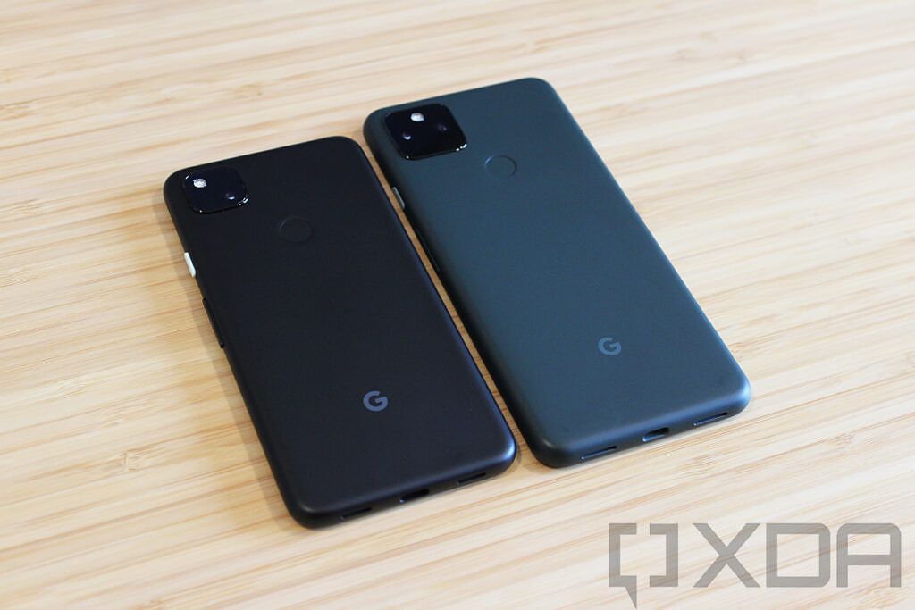 Google Pixel 4a next to Pixel 5a on wooden table