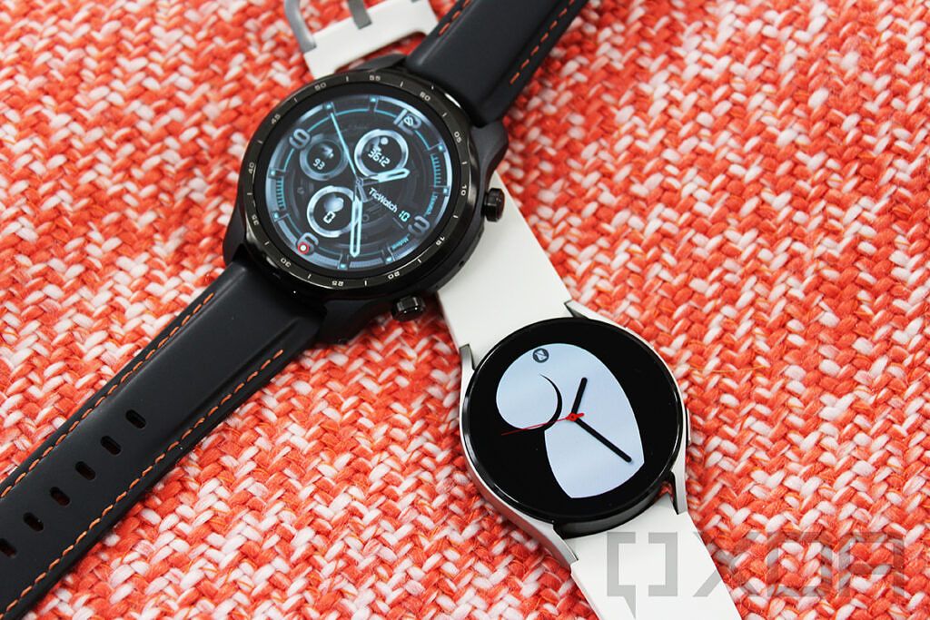 Samsung Galaxy Watch 4 and TicWatch Pro 3 with red and white cloth in background