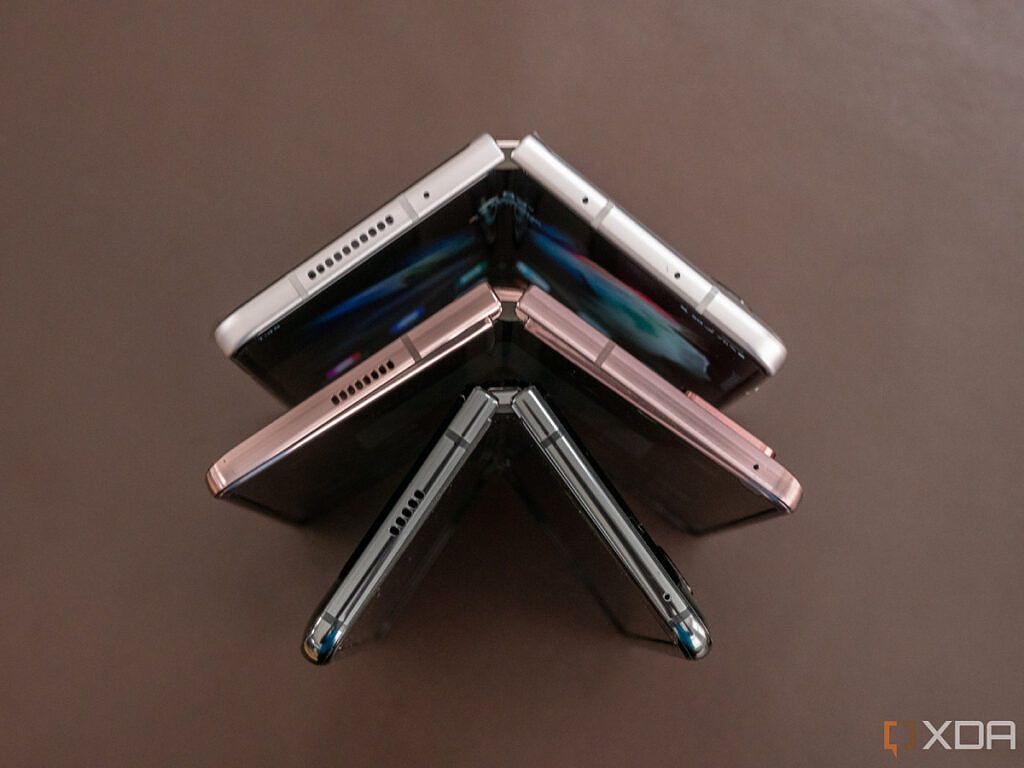 Top-down view of Samsung Galaxy Z Fold 3 and previous generations, partially folded