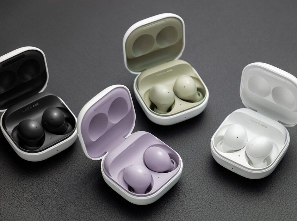 Samsung Galaxy Buds 2 in Graphite Black, Lavender Purple, Olive Green, and White, kept open in their cases