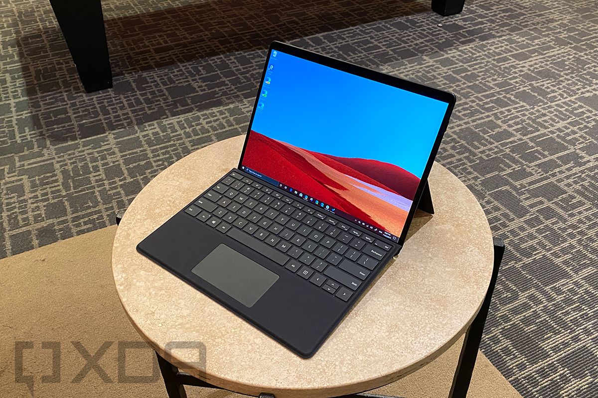 Surface Pro X in black on small table