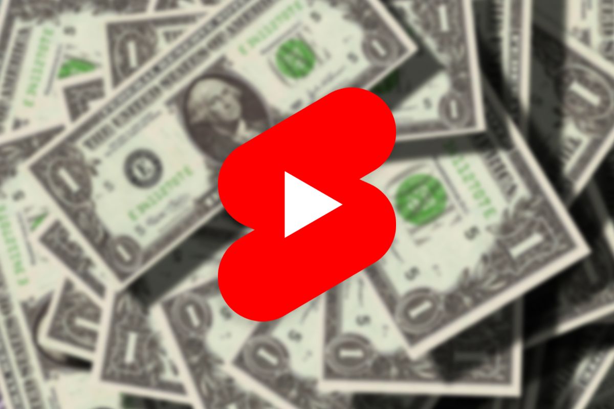 YouTube Shorts logo on a pile of dollar bills