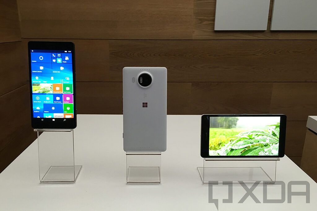 Three Lumia 950 XL units on stands