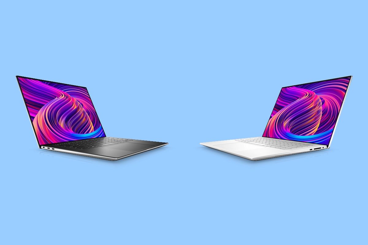 Dell XPS 15 in different colors facing each other