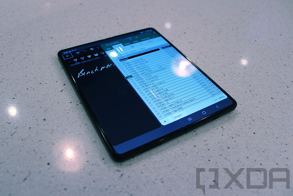 Samsung Galaxy Z Fold 3 showing split-screen OneNote and Office
