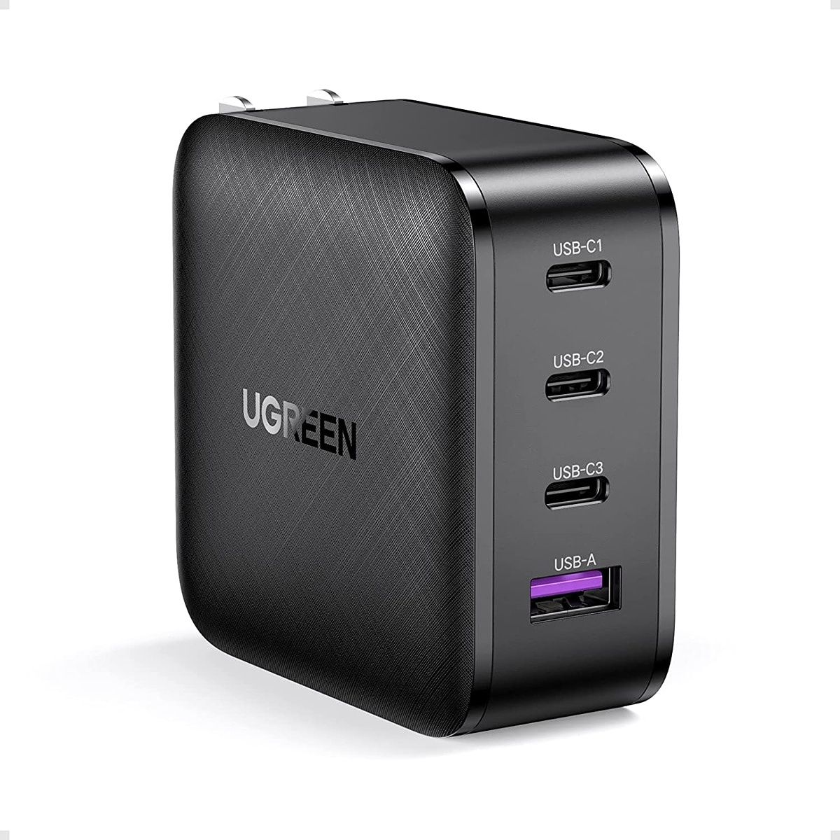 The Ugreen fast charger packs four USB ports that you can use to charge multiple devices simultaneously. There are three Type-C ports and one Type-A, of which the top two Type-C ports can deliver up to 65W of power when only one port is being used. In addition, the charger supports USB PPS.