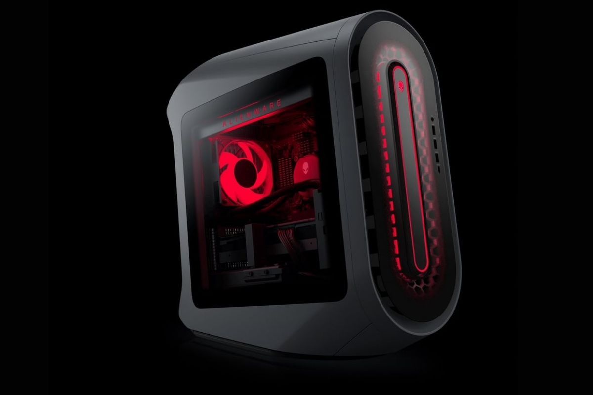 An alienware desktop PC with red colored RGB lights inside the chassis
