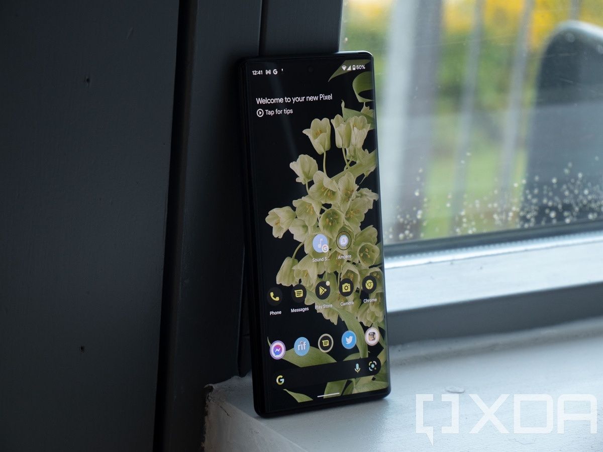 Pixel 6 Pro with bloom wallpaper on window sill