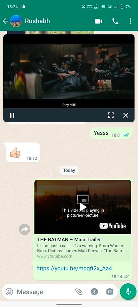 A video being played in picture-in-picture mode in a WhatsApp chat