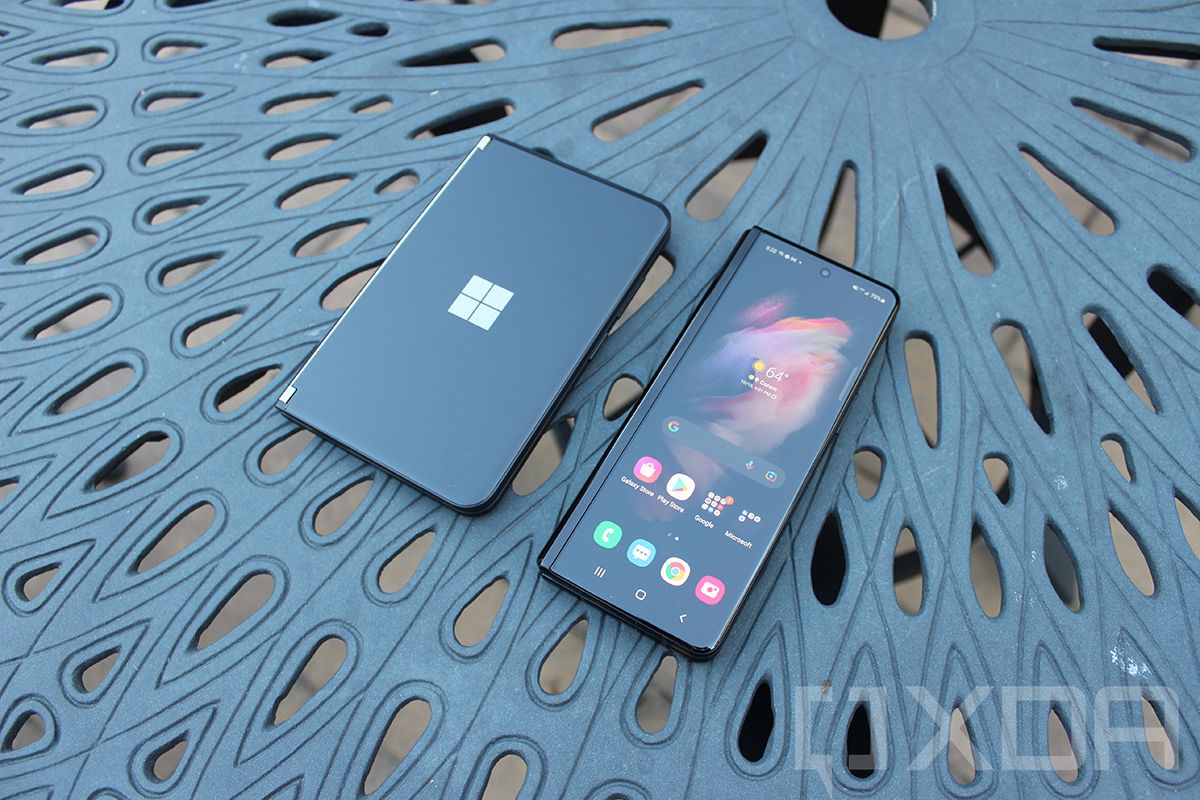 Dual screen phone and foldable phone on table
