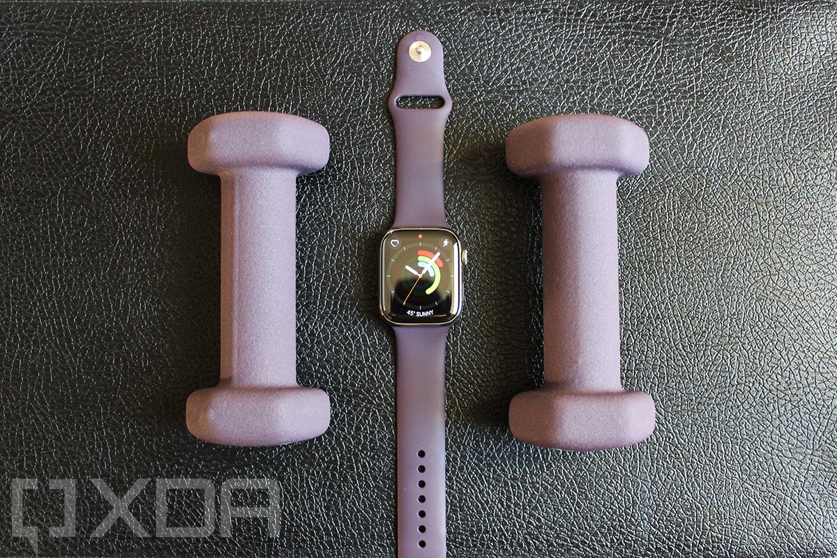 Apple Watch Series 7 and dumbbells