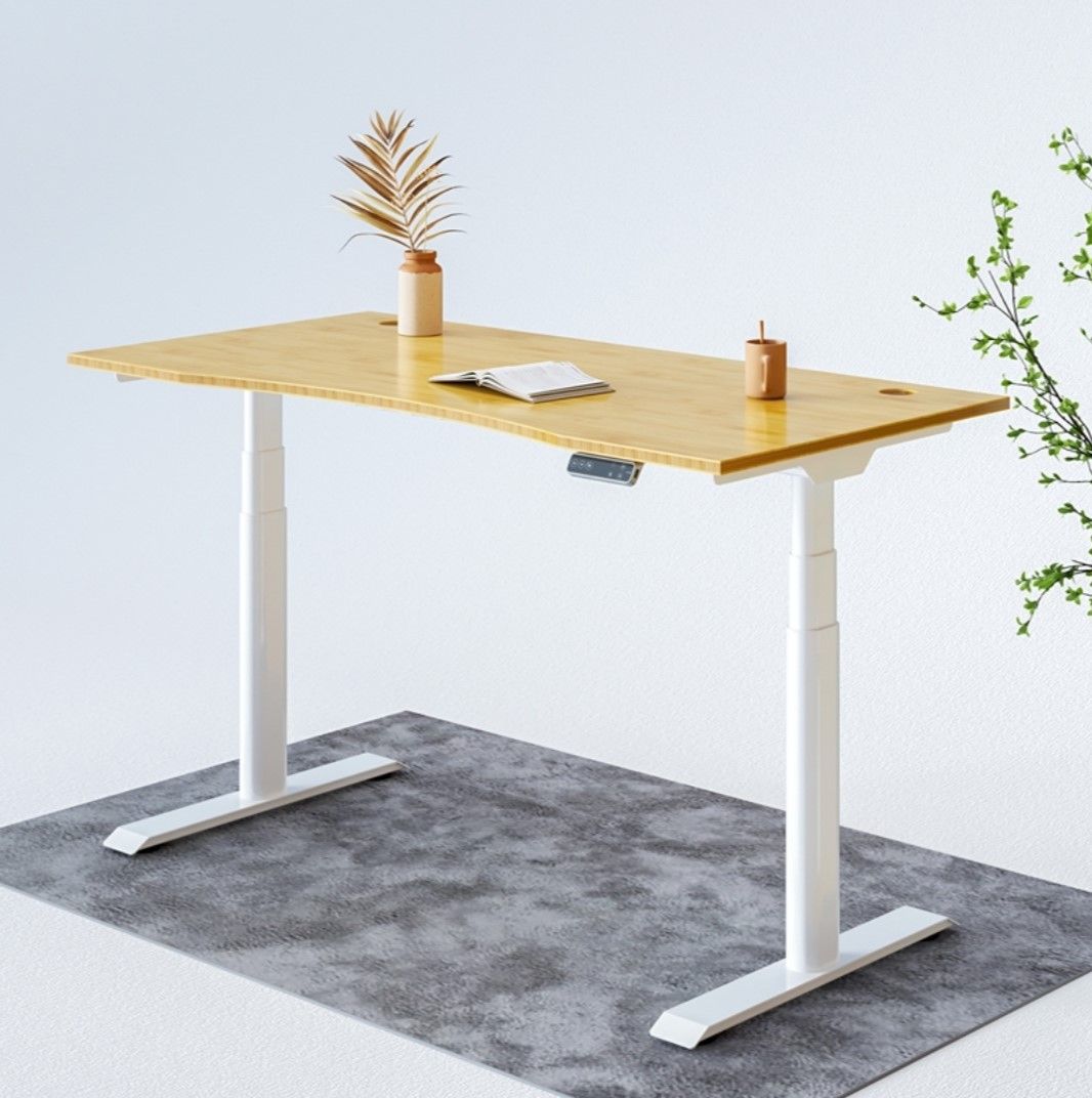 This desk has a bamboo desktop, can hold up to 275 pounds, and is between 23.6 and 49.2 inches
