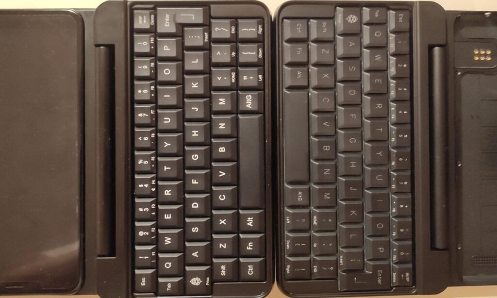 Photo of prototype and final PinePhone keyboards