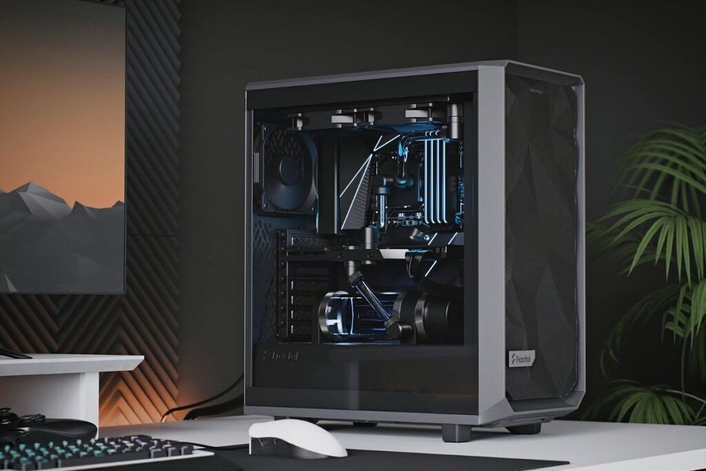 A black colored Fractal Design Meshify 2 Compact case with no side panel kept on a white colored desk