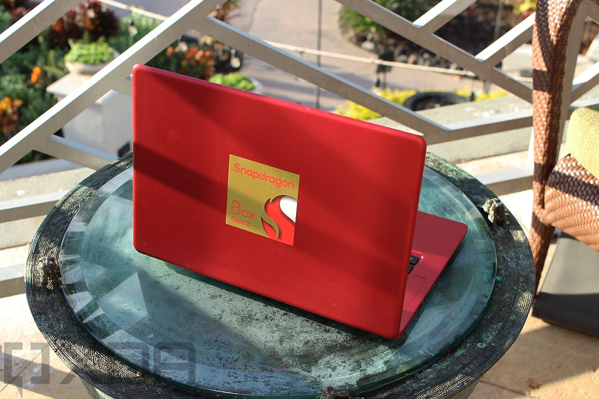 Red laptop with Qualcomm Snapdragon branding