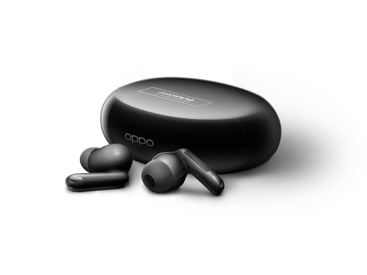 OPPO Enco X2 earbuds sitting beside a charging case