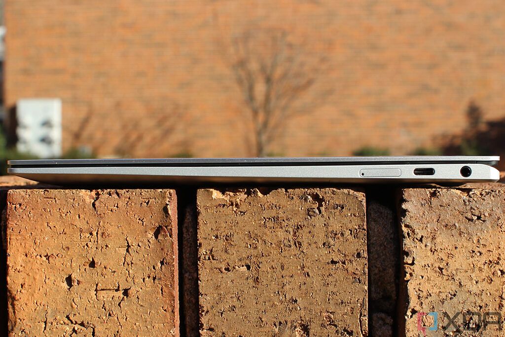 Side view of laptop with USB C port and headphone jack