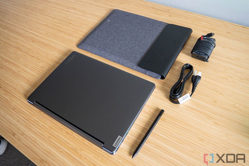 Lenovo Yoga 9i with case, pen, and power cable