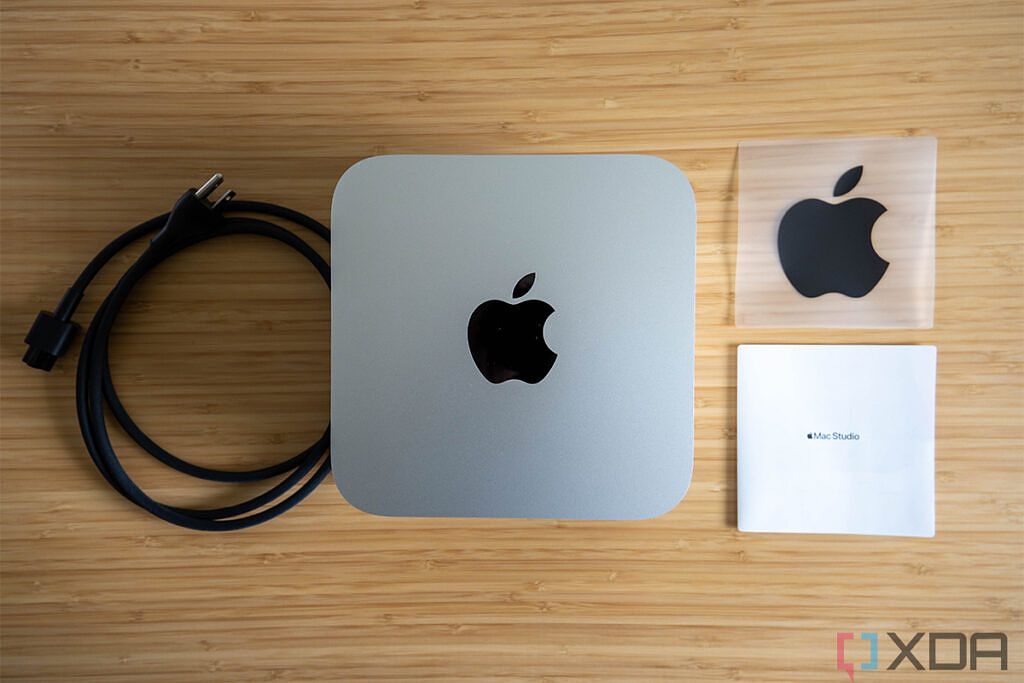 Mac Studio with power cable and paperwork