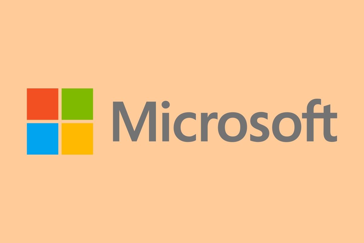 Microsoft logo on a light orange background