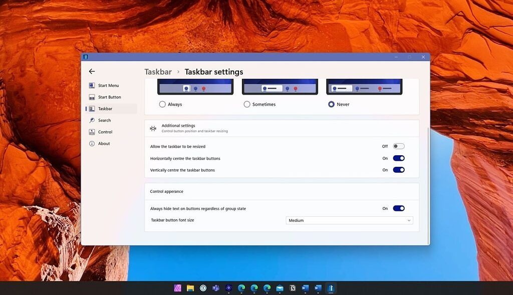 Windows 11 taskbar with ungrouped icons with no labels aligned at the center with Start button on the left