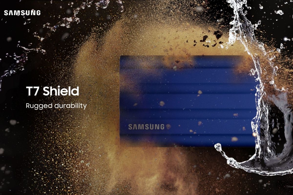 Samsung T7 Shield SSD shown next to water and dust